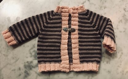 Baby cardie with metal clasp