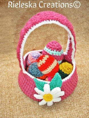 Easter flower basket and coloured easter eggs