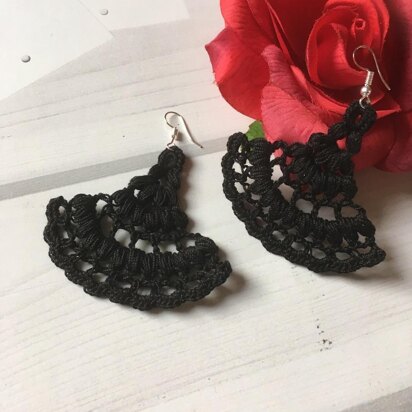 102. Black openwork earrings