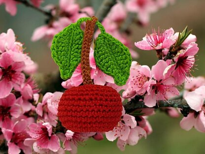 Cherry with stalk and leaves