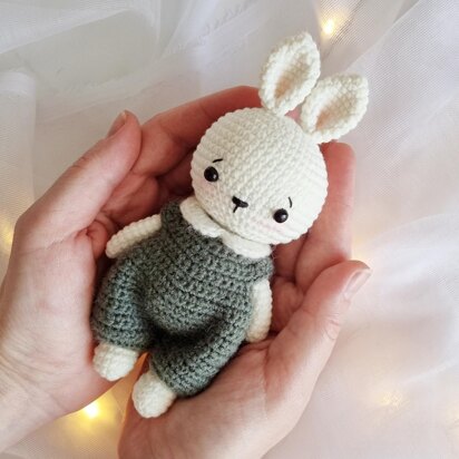 Crochet pattern little bunny toy in green jumpsuit