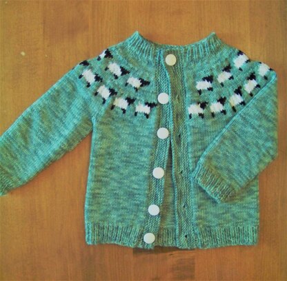 Sheep in a meadow cardigan for a baby