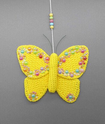 Butterfly hanging decoration - simple made from scraps of yarn