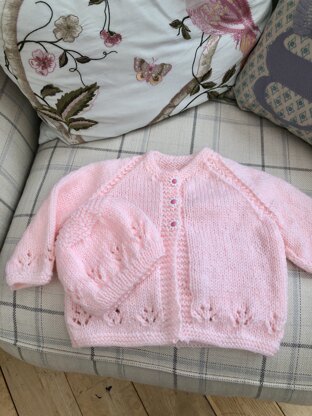 pink baby cardigan and hat