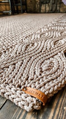 Wide rug with double braid