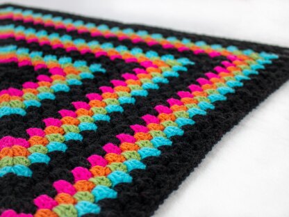 Pink and outlet black crochet blanket