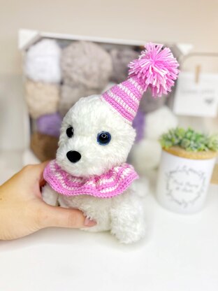 Cute plush fur seal in a hood