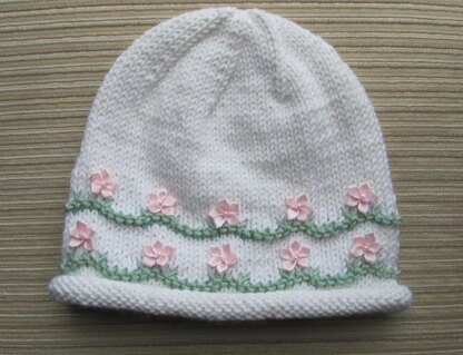 White Hat with Pink Flowers for a Girl in Sizes 6 months and 2-4 years