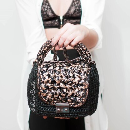 Bag with puff stitch flap