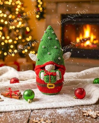 Сhristmas gnome Elf with a gift