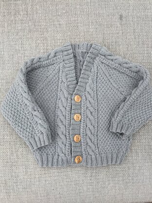Moss Stitch and cable raglan cardigan baby