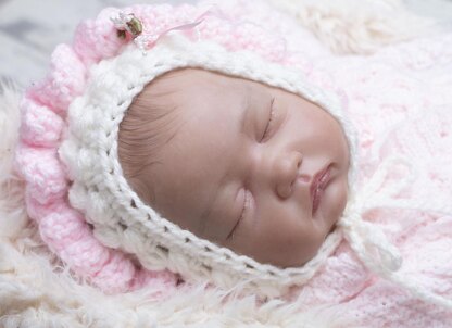 Newborn baby Aran bonnet crochet pattern with 4 finishes