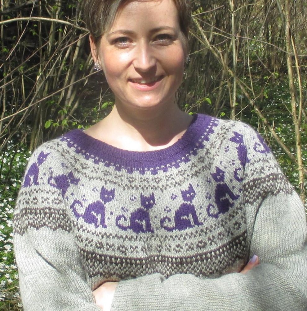 I made a folklore sweater for my friend's cat and it was