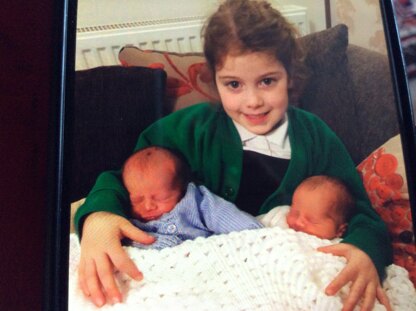 New twins with proud sister