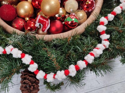 White Christmas Decorations And Popcorn Garland On Fir Tree