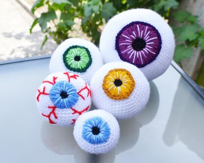 Crochet eyeballs. Creepy eyes. Halloween spooky eyes. Eyeball with blood vessels