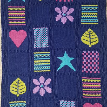 Multi Motif Cot Blanket