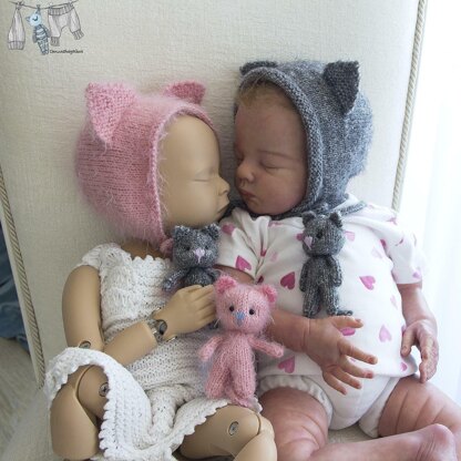 Cat bonnet and tiny cat toy