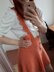 Cute peach skirt with suspenders