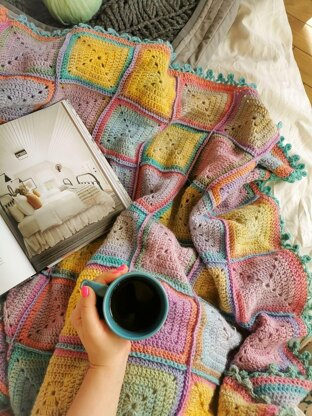 Energy Boosting Granny Square blanket in gradient ombre yarn