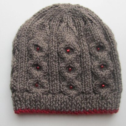 Brown Hat with Cables for a Lady - knitting pattern