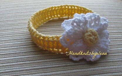 Yellow Knitted Headband with a White Flower