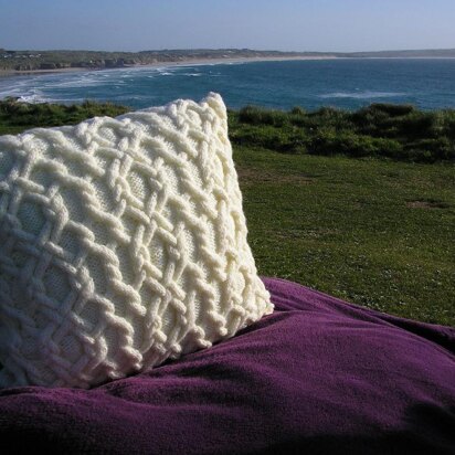 Cabled knitted cushions