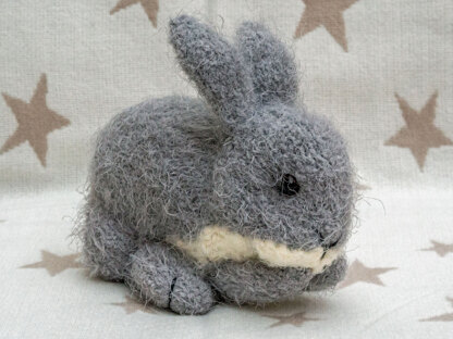 Soft grey sitting bunny