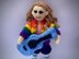 Senna doll with guitar