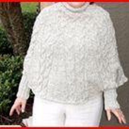 Cabled poncho with cuffs