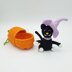 Black Cat in Pumpkin