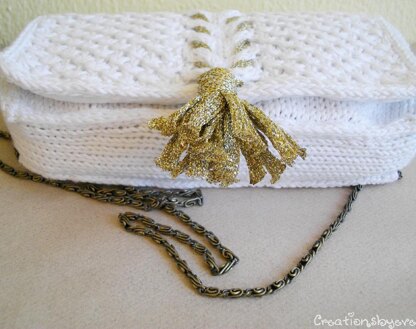 White knit clutch with gold tassel