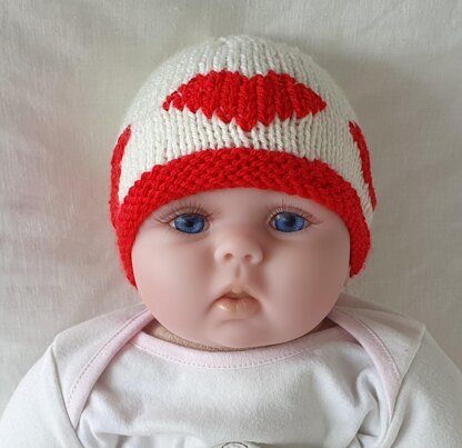 Kaley - Baby’s 8ply beanie with embroidered heart motifs