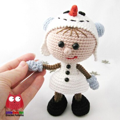 Girl doll in a Snowman outfit