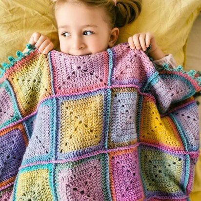 Energy Boosting Granny Square blanket in gradient ombre yarn