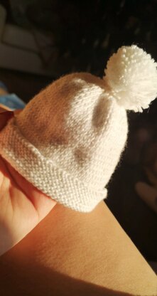 Knitted baby pom pom hat