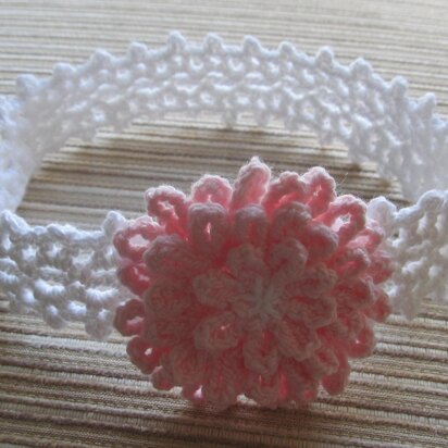 White Lacy Crochet Headband with a Pink Flower