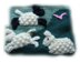 LAMBS & LULLABIES pram or cot cover knitting pattern by Georgina Manvell