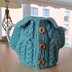 Aran jacket tea cosy