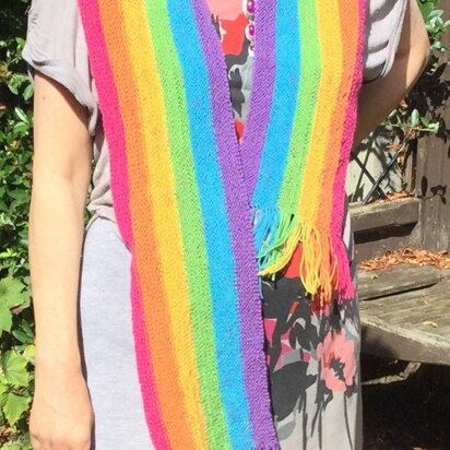 Sideways knitted rainbow scarf