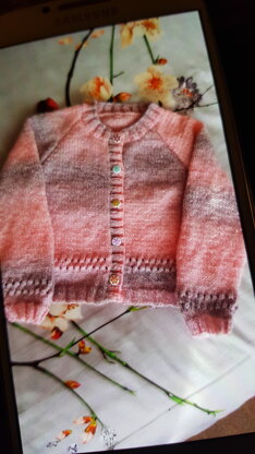 Arya's pink cardi