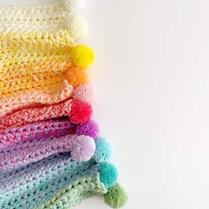 Little Gems Rainbow Pom Blanket Crochet pattern by Little Gems