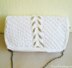 White knit clutch with gold tassel