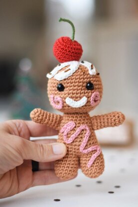 Amigurumi gingerbread with a cherry on top