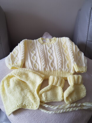 Baby's sweater, helmet and bootees