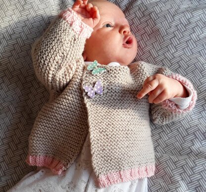 Easy asymmetric baby cardigan - one piece knit in DK