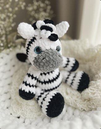 Giraffe and Zebra plush toys