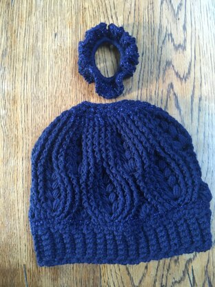 Blue sparkle woven hearts bun beanie