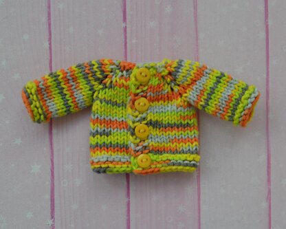 Knitted clothes for doll