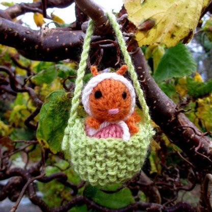 Tiny Squirrel in an Acorn Cup